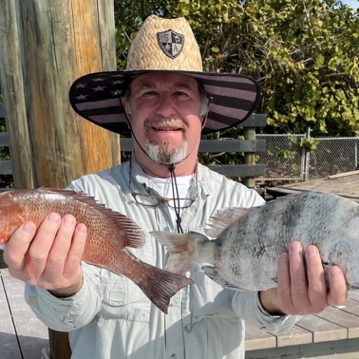 My dad with a snapper and a sheepshead