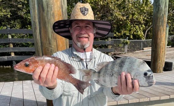 My dad with a snapper and a sheepshead